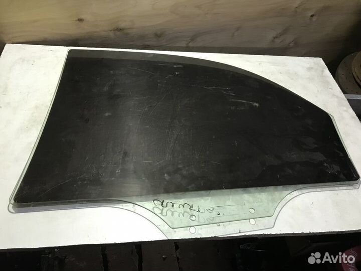 Стекло заднее правое Kia Spectra
