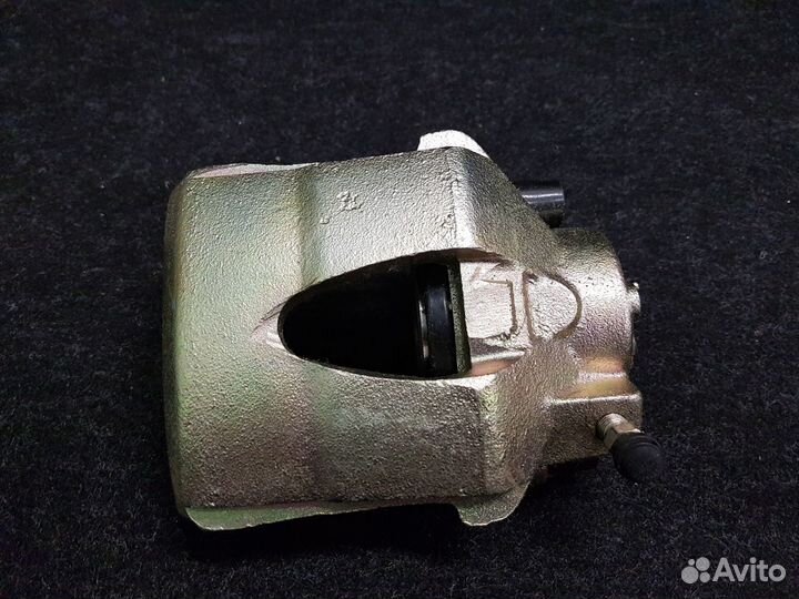 Суппорт тормозной L 1K0615123A VW Golf 5.Octavia