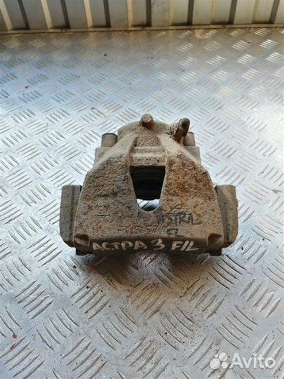 Суппорт тормозной передний левый Opel Astra H L69