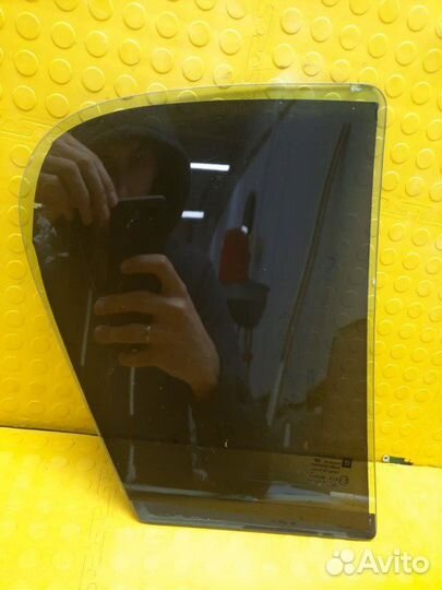 Стекло боковое заднее левое Opel Astra H 5D