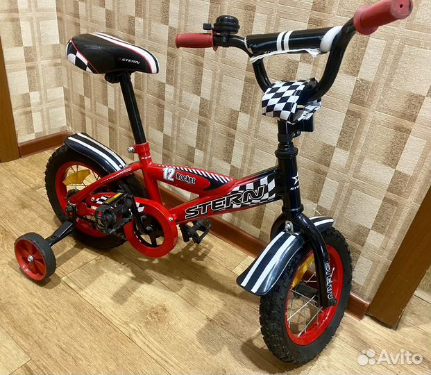 Детский велосипед с боковыми колесами