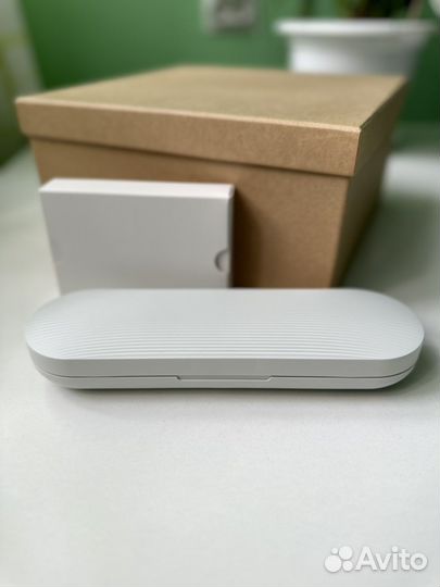 Электрическая зубная щетка