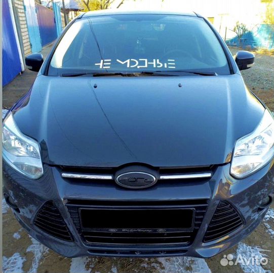 Наклейки на эмблемы черные Ford Focus