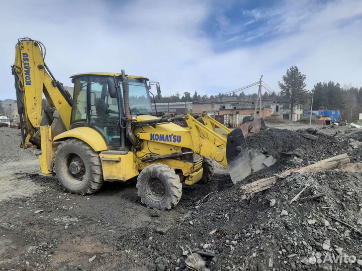 Услуги экскаватора-погрузчика