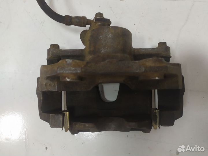 Суппорт тормозной передний левый Rapid 2013-2020