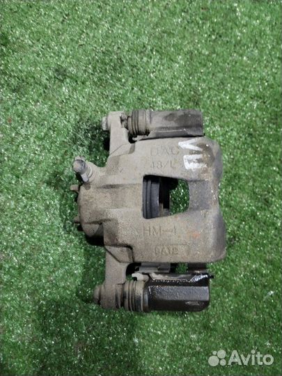 Суппорт тормозной передний левый Chevrolet Spark