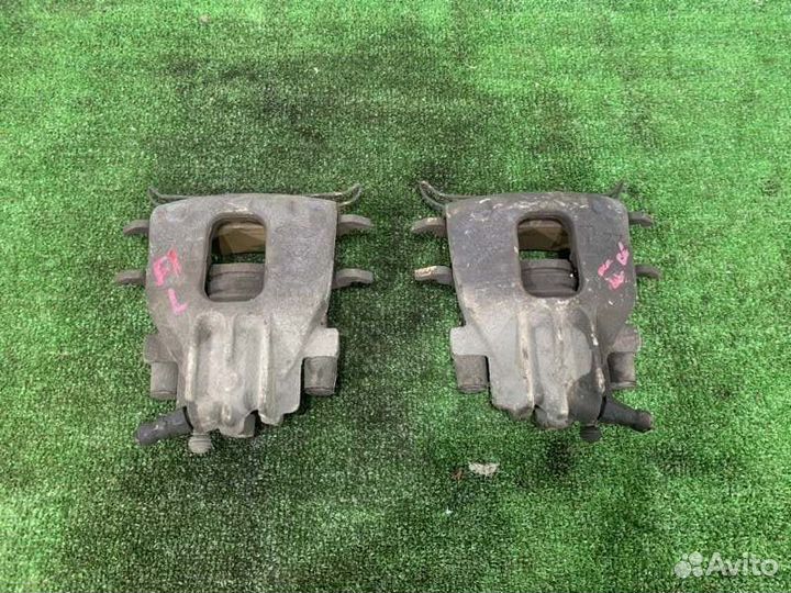 Суппорт тормозной передний Ford Focus седан 1.8