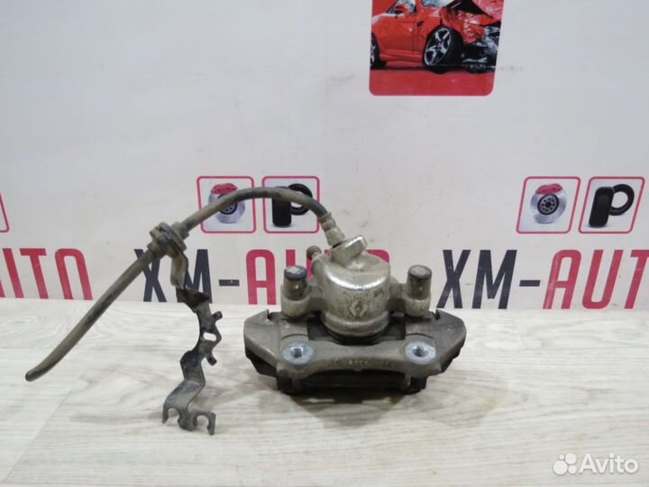 Суппорт тормозной передний левый Renault Sandero 2