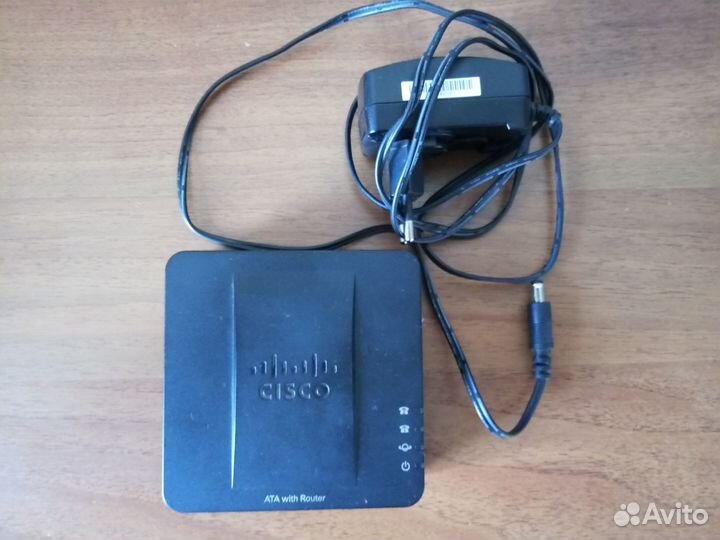 Адаптер для VoIP-телефонии Cisco SPA122