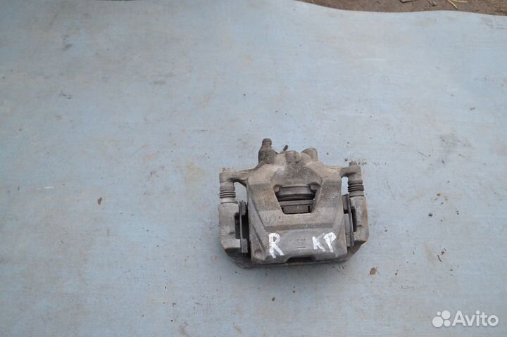 Супорт тормозной передний Chevrolet Cruze