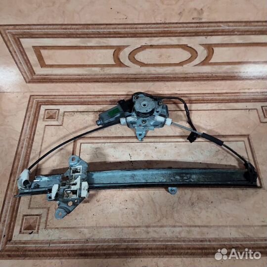 Стеклоподъемник передний Nissan Almera Classic