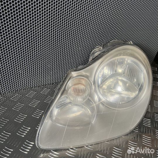 Фара левая Porsche Cayenne