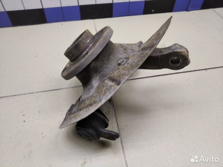 Кулак поворотный передний левый Doblo 2005-2015