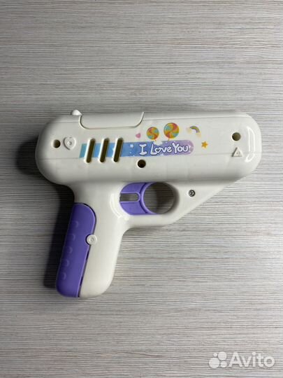 Игрушка пистолет