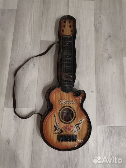 Детские игрушки гитара