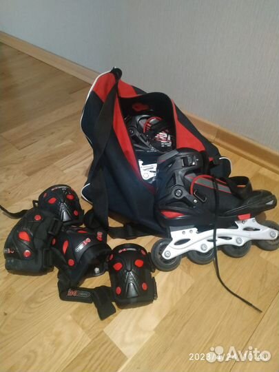 Роликовые коньки