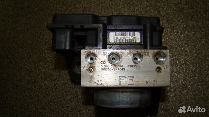 Блок ABS (насос) Opel Corsa D