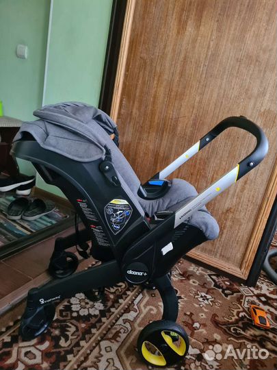 Коляска автокресло doona с базой isofix