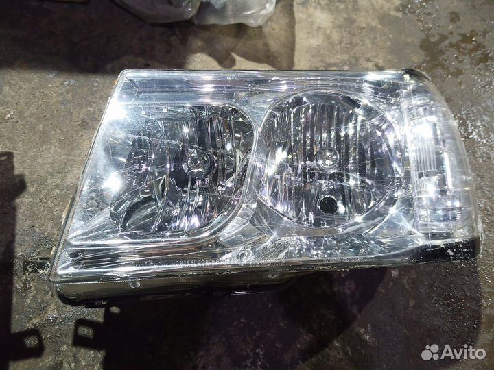 D12-1103P-LD-E1 Фары Land Cruiser 100