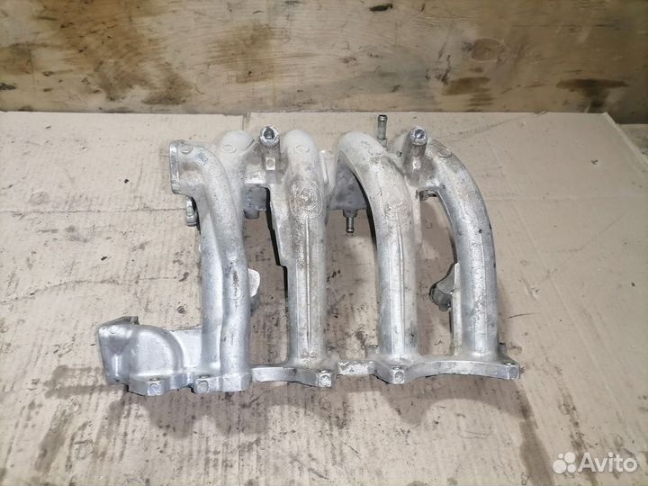 Впускной коллектор Митсубиси Лансер 8