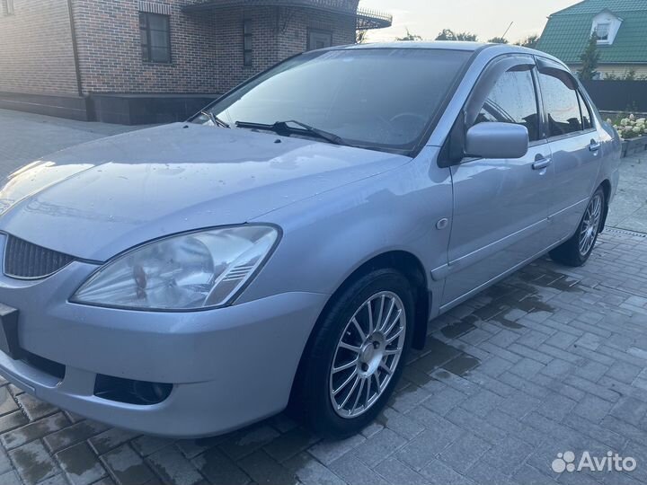 Mitsubishi Lancer 1.6 МТ, 2005, 300 000 км