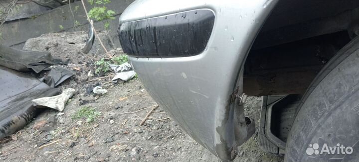 Задний бампер Nisan march k11