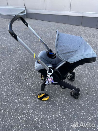 Коляска автокресло doona с базой isofix