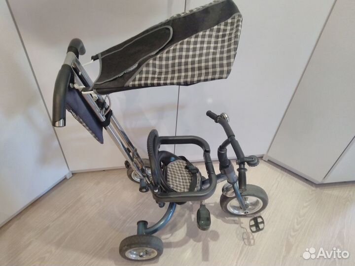 Трехколесный велосипед с ручкой