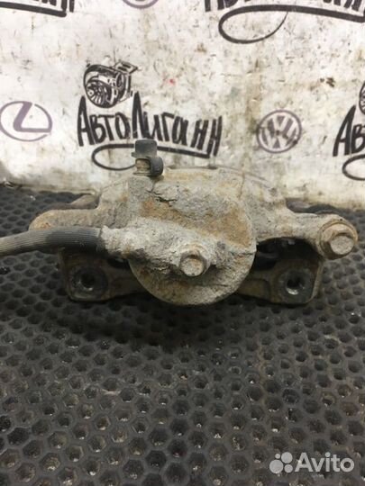 Суппорт передний левый Chevrolet Aveo T 250 F14D3