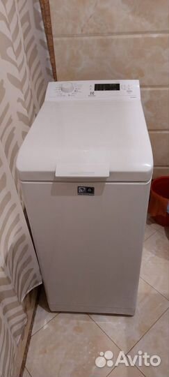 Стиральная машина с вертикальной загрузкой