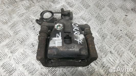 Суппорт тормозной задний левый ford kuga 1 (OKR07M