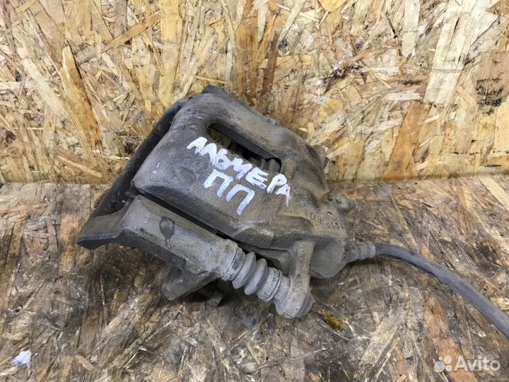 Суппорт передний правый Альмера Логан Ларгус К4М