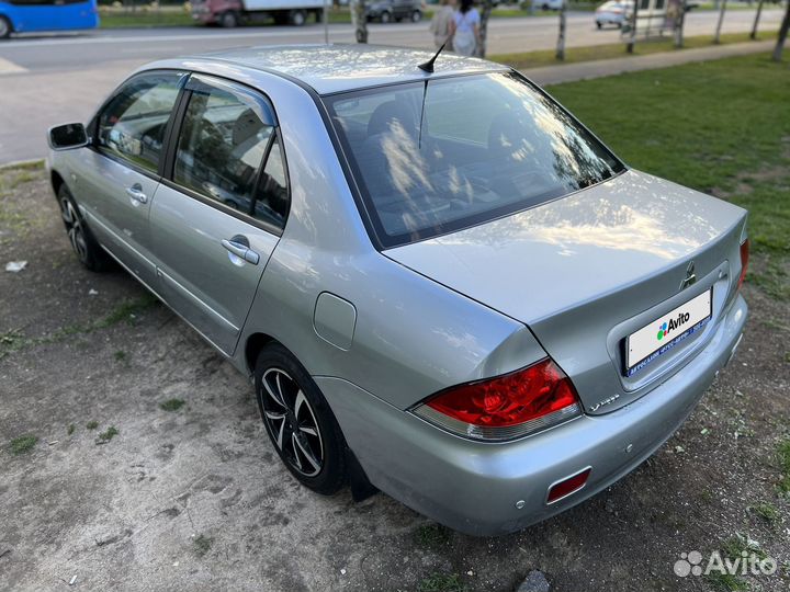 Mitsubishi Lancer 1.6 МТ, 2009, 240 000 км