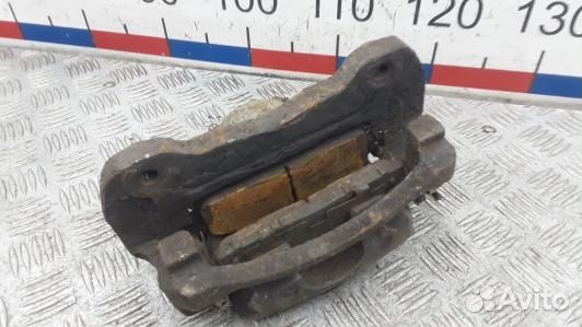 Суппорт тормозной передний левый mitsubishi L200 K