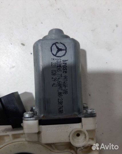 Моторчик стеклоподъемника задний левый