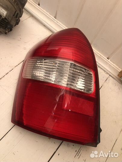 Фонарь задний левый