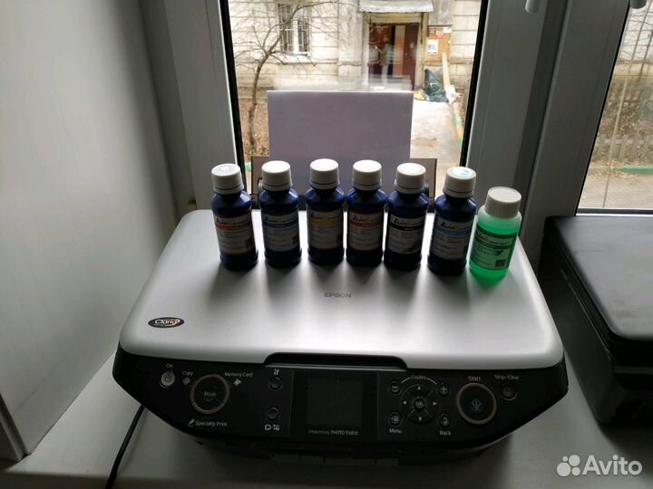 Цветной мфу Epson RX610