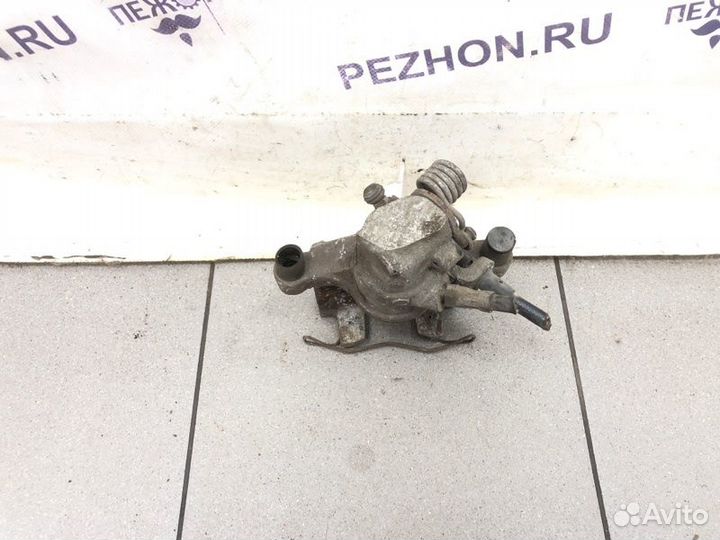 Суппорт тормозной задний левый Ford Focus хэтчбек