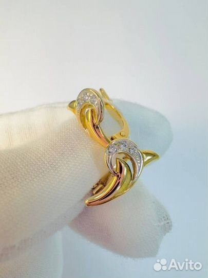 Золотые серьги с камнем