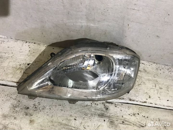 Largus фара левая