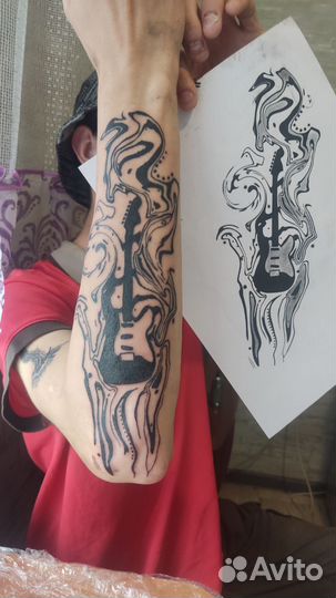 Мастер татуировок