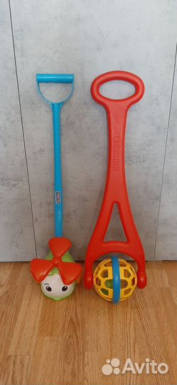 Игрушка каталка