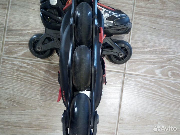 Роликовые коньки