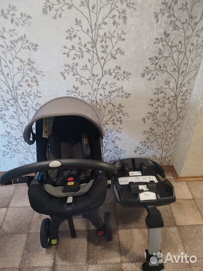 Коляска автокресло doona с базой isofix