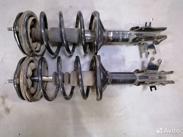 Амортизатор передний Mitsubishi Lancer (CK) 1997