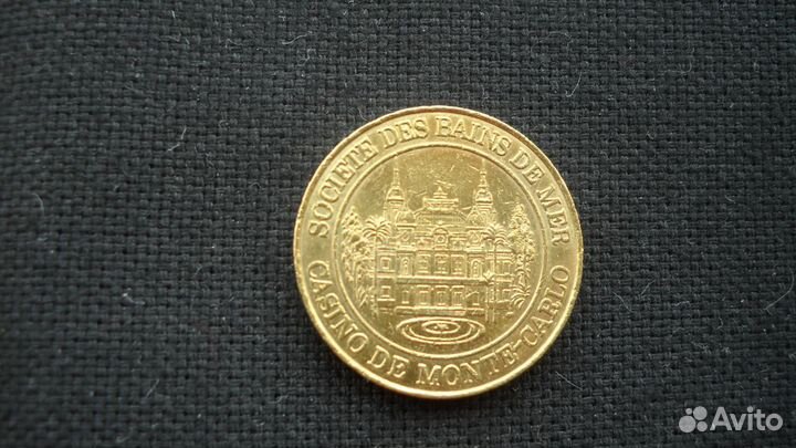 Жетон казино Монте Карло (в Монако )