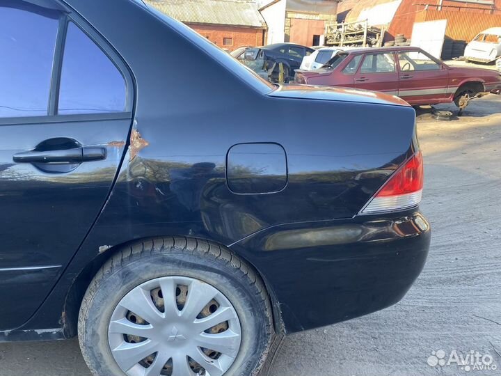 Крыло заднее левое Mitsubishi Lancer 9
