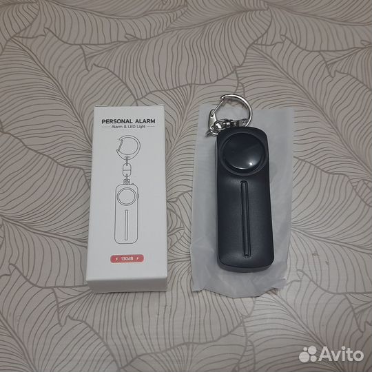 Карманный брелок-сигнализация для самозащиты