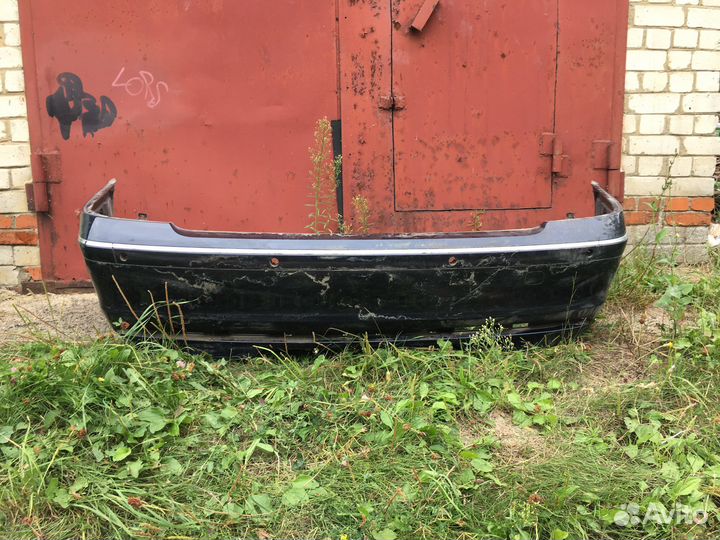 Бампер задний е65