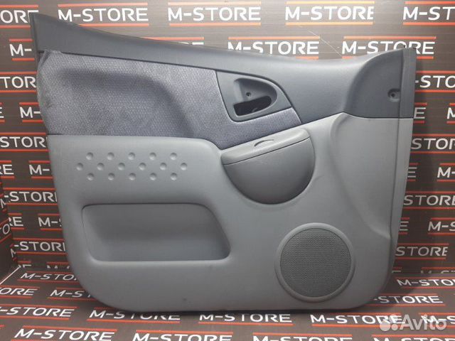 Обшивка двери передняя левая Toyota Funcargo NCP20